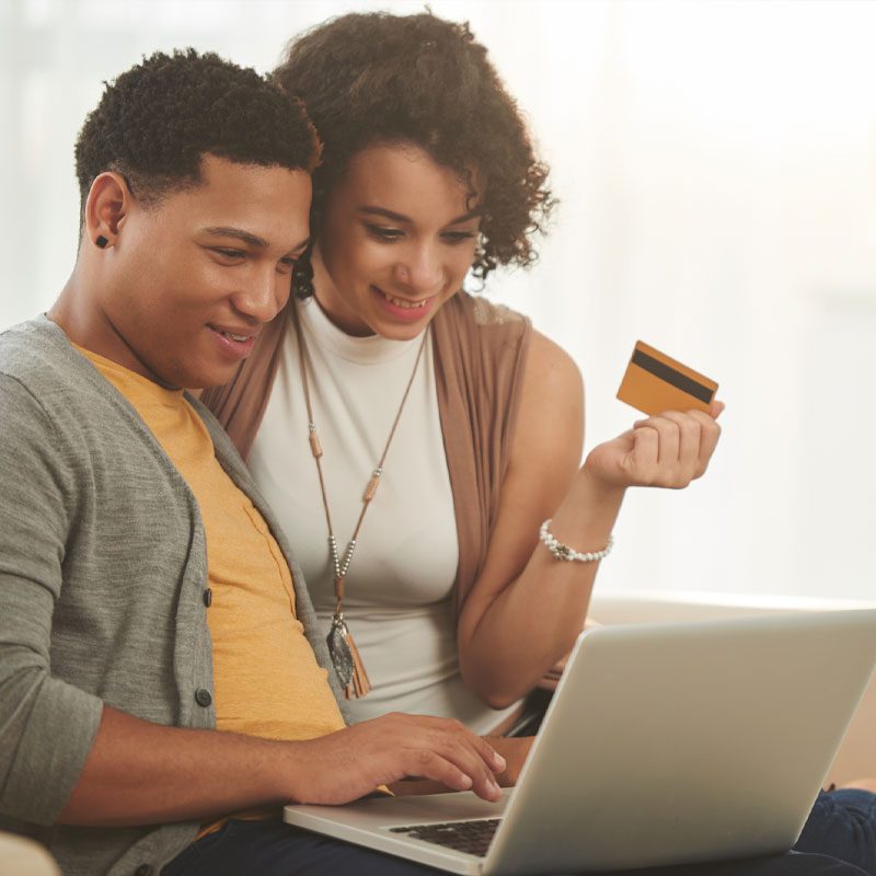 Couple paying a bill together